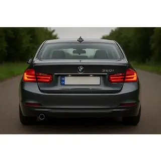 Stainless steel trim above license plate photo 1