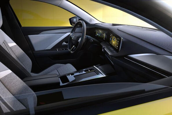 Overview of the compact hatchback Opel Astra of the sixth generation Photo 6