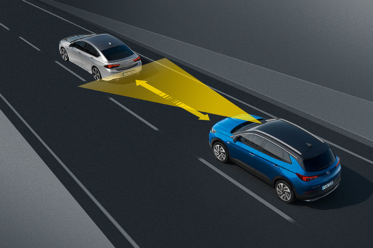 What is adaptive cruise control and how does it work?