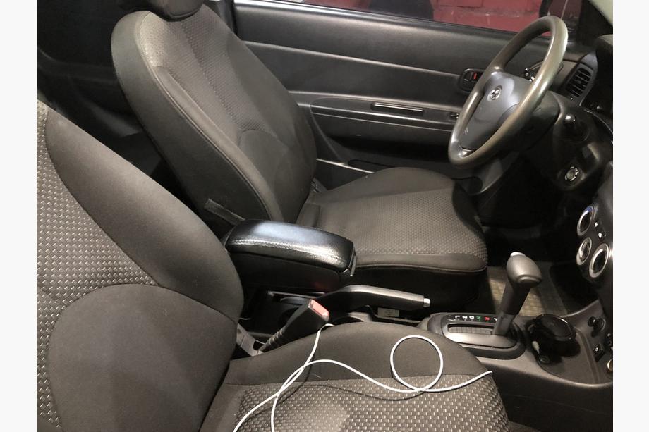 Hyundai Accent 2006-2010 Armrest with Cup Holder Image