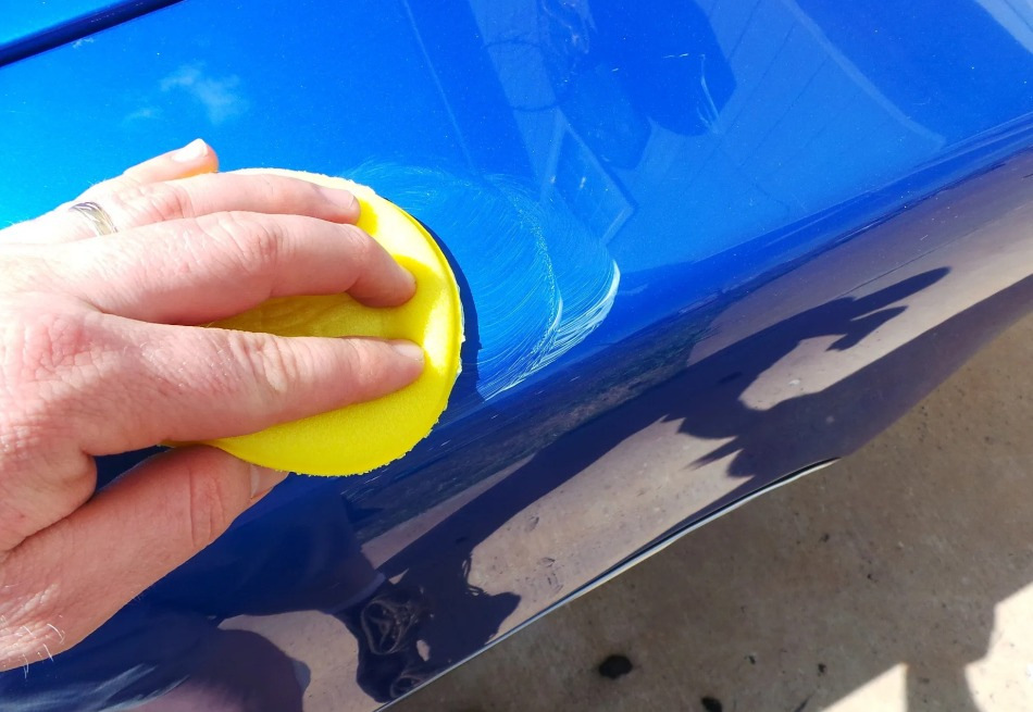 Can I apply regular wax to a wet car?