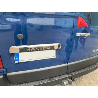 Stainless steel trim above license plate photo 1