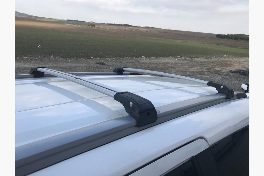 Dacia Lodgy 2012-2022 Roof rack (cross bars) for integrated roof rails lockable WingCarrier V2 (2 pcs) Gray Image