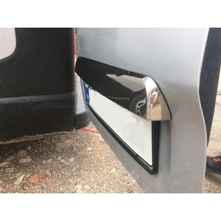 Stainless steel trim above license plate photo 4