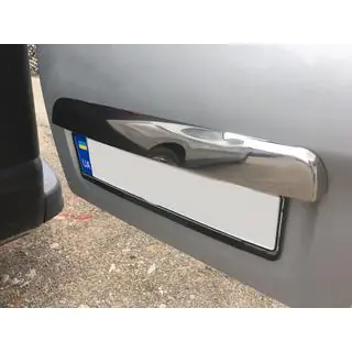 Stainless steel trim above license plate photo 1