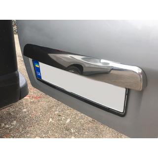 Stainless steel trim above license plate photo 4