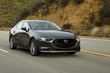 The fourth generation compact sedan Mazda 3 photo 7