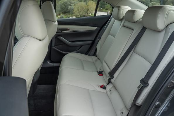 The fourth generation compact sedan Mazda 3 Photo 10