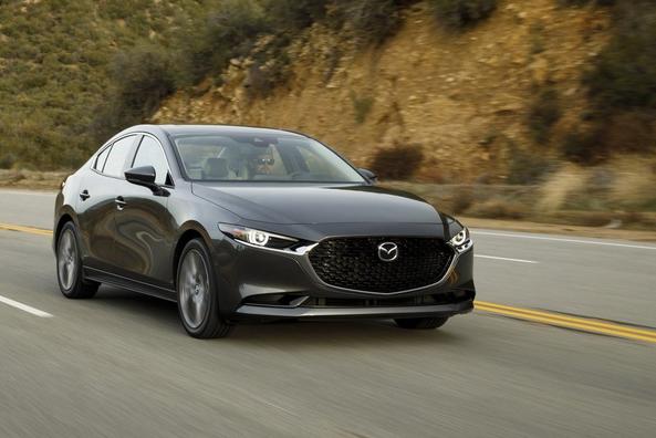 The fourth generation compact sedan Mazda 3 Photo 7