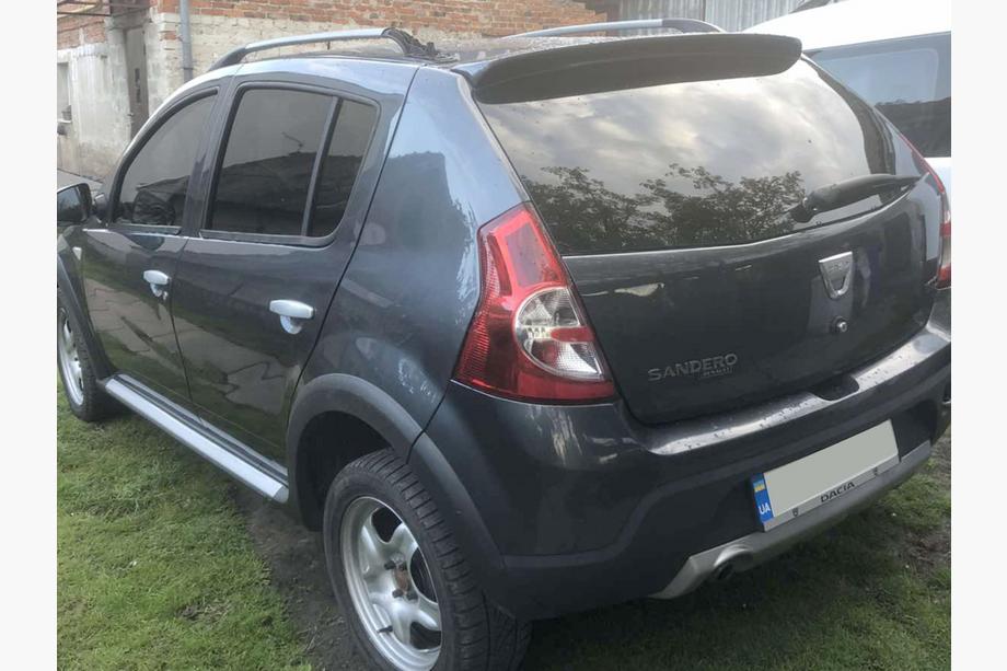 Renault Sandero 2007-2013 Spoiler (primed for painting) Photo 3